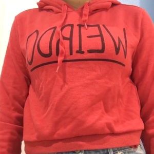 a red cropped sweater